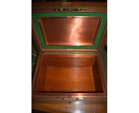 A 20th Century walnut humidor, by Alfred Dunhill, London, of rectangular form with copper lined interior, 13 x 9 1/2 x 7in. (