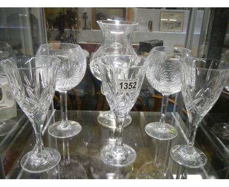 A glass candle lamp and five glasses. COLLECT ONLY.