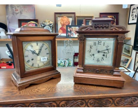 An Edwardian oak mantle/bracket clock with silvered dial and a Trister 31 day mantle clock, all springs ok. In need of attent