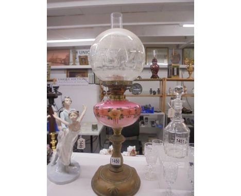 A Victorian oil lamp on a brass base with a handpainted pink glass font and acid etched shade, COLLECT ONLY. TNibbles to bott