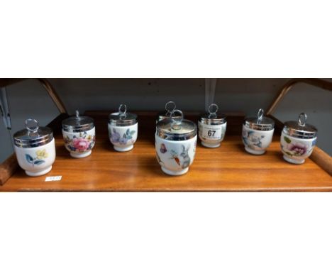 A quantity of Royal Worcester egg coddlers 1large and 7 small