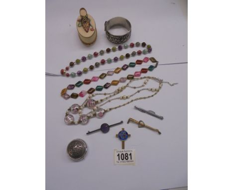 Three stone necklaces, a white metal bangle, a pill box etc.,