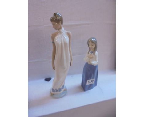 Two NAO by Lladro figurines.No damage of any sort