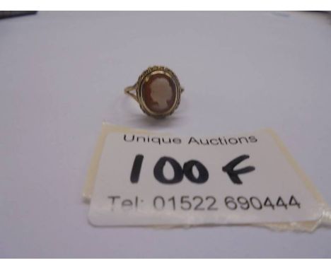 A 9ct gold cameo ring, profile of a young woman in a ropework mount, size K, 2.5 grams.