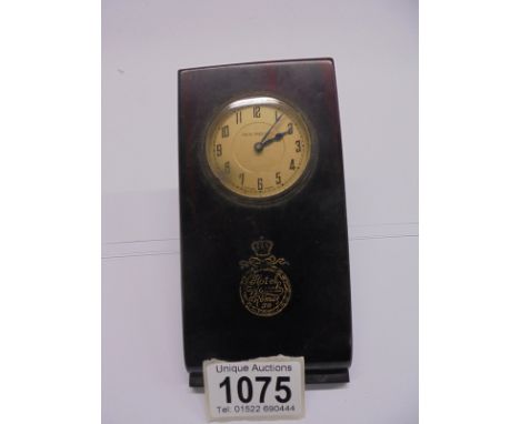 A vintage bakelite Hotel Royal Rome desk paperclip with integral clock.Size base 13.75cm x 7cm x 7cm thick.   Top 13.5cm x 7c