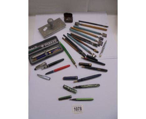 A mixed lot of vintage dip pens, fountain pens, nibs etc.,