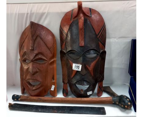Wooden tribal masks, axe etc