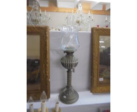A brass oil lamp with shade, COLLECT ONLY.