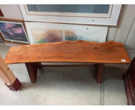 A rustic oak sliced tree trunk bench, length 138cm COLLECT ONLY