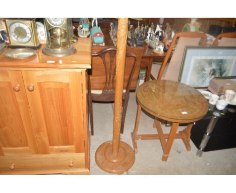 A Chinese camphor wood standard lamp 