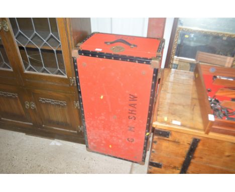A metal bound travelling trunk