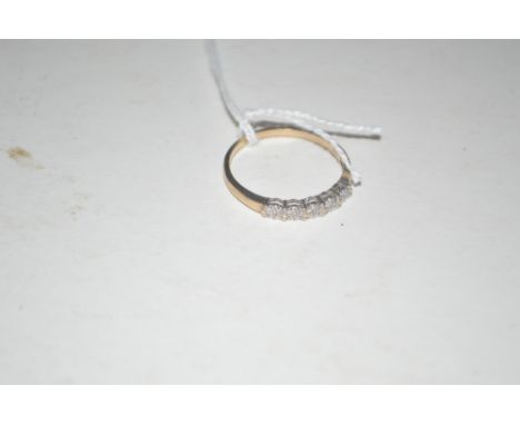 A 9ct gold diamond set ring 
