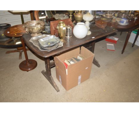 An Ercol dining table; and a set of four ladder back chairs 