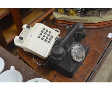 A Bakelite rotary dial telephone AF; and a modern dial telephone 