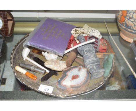 An Eastern brass tray; together with two clay pipes; a Cowry shell,; an Oriental jade figure; a pair of ivory glove stretcher