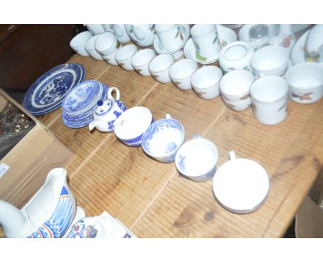 A quantity of blue and white dinner plates, tea cups and saucers, a bachelors teapot etc. 