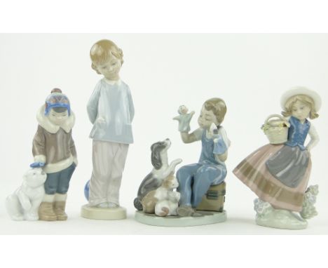 Lladro Eskimo and polar bear cub, 5.7",
and 3 other Lladro figures, (4).