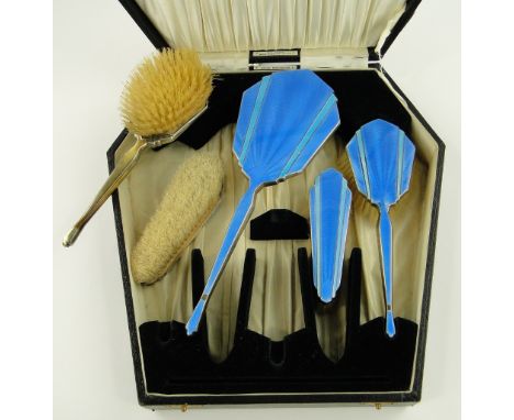 Art Deco 5-piece silver and blue enamel backed brush and mirror set,
Birmingham 1932.