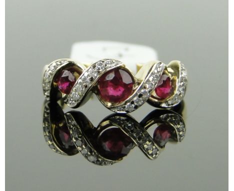 9ct gold ruby and diamond ring, size I.