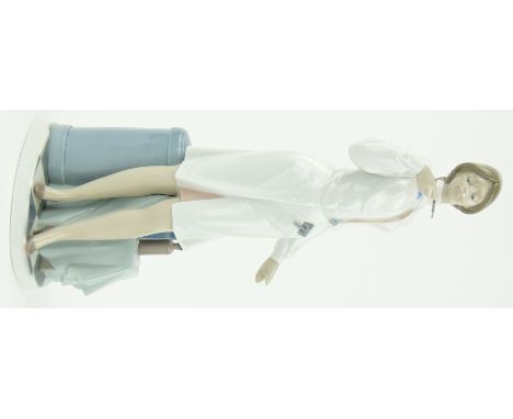 Lladro anesthetist figure, 13.5".
