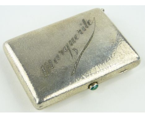 A continental silver compact/nesessaire,
the cover having a diamond set engraved name "Marguerite," a green stone set button,