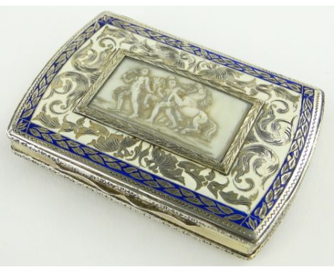 An ornate continental silver blue and white enamel box of rectangular form,
the lid having an inset carved ivory panel depict