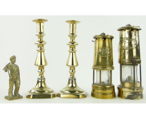 Brass miner's lamp by Thomas & Williams,
10" and a smaller Welsh miner's lamp, a miner and a pair of candlesticks, (5).
