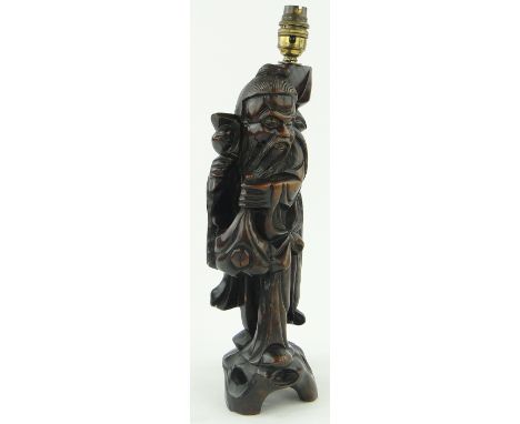 Carved hardwood Oriental figure lamp, 16.25".