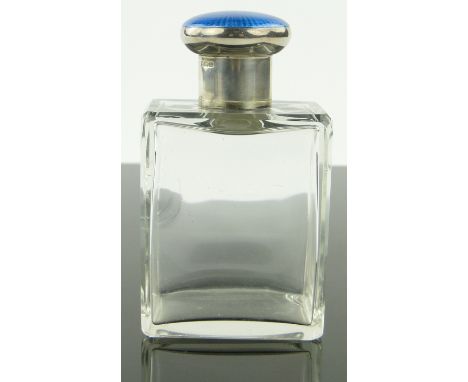 Asprey's cut-glass silver and blue enamel topped perfume bottle,
(glass chipped) height 11.5cm.