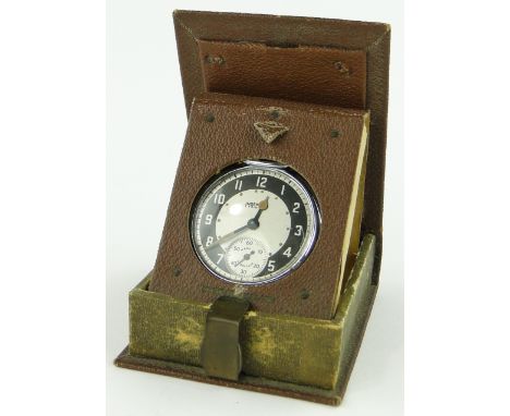 A Vintage Ingersoll Triumph pocket watch in travelling case.