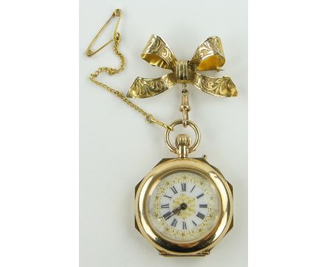 A Swiss 14ct gold and painted enamel pendant watch of octagonal form,
the painted enamel back depicting a girl with sheep, gi