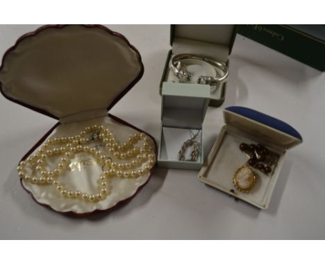 A white metal bangle; together with a silver necklace and pendant; a silver thimble; cameo brooch etc. 