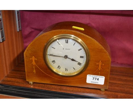 An Edwardian mahogany and inlaid eight day mantel clock 
