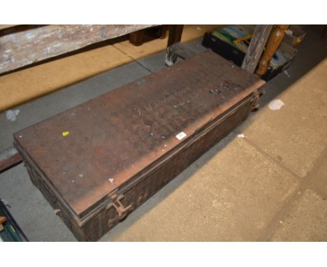 An oblong tin trunk