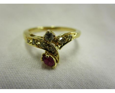 18ct gold diamond and ruby ring