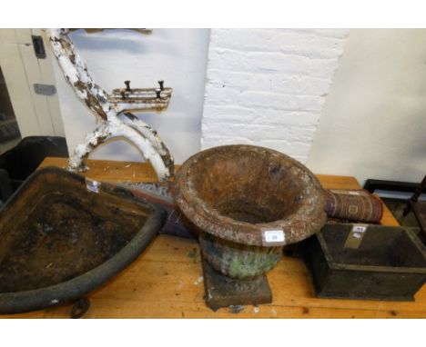 Victorian cast metal garden bench ends, cast garden planter, cast iron manger from a Victorian stable, cast iron 'rain hopper