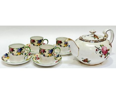 An Aynsley china set of four coffee cans and saucers with floral decoration and green trim, together with an Aynsley teapot t