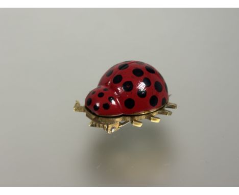 A French novelty ladybird brooch watch with fold out shell with gilt metal miniture manual wind watch with silvered dial D x 