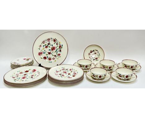 A group of Royal Worcester 'Astley' pattern crockery decorated with bright floral sprays compromising five twin-handled soup 