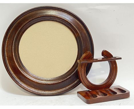 A circular oak wall-mounted picture frame (w- 36cm), together with a horseshoe form pipe rack (2)