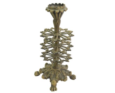 Victorian brass two tier cotton reel stand, with vacant finial of fluted form, on a acanthus cast base with four lion paw sup