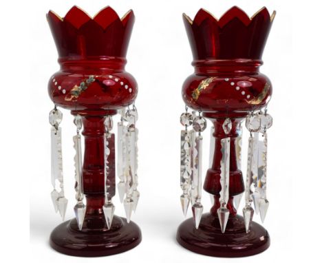 Pair of 20th century ruby glass table lustres, each with gilt and polychrome decoration, lacking one prism drop, H36cm
