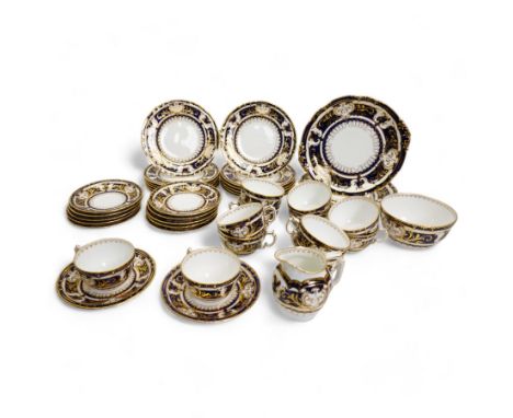Royal Crown Derby tea service for twelve, circa 1930, comprising twelve teacups, saucers & tea plates, two serving plates, su