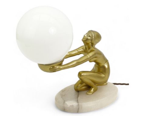 Art Deco gilt patinated spelter table lamp, modelled as a semi-nude female, kneeling with arms outstretched and holding the g