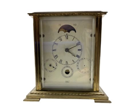 French - 20th century 8-day brass cased table clock, with five bevelled glass panels and multi-dial recording the time, date 