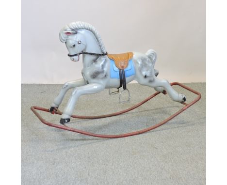 A vintage painted metal rocking horse, 127cm long