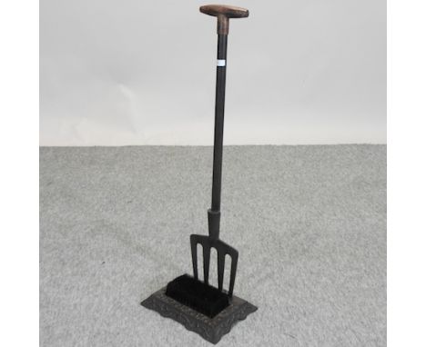 A boot scraper and brush, in the form of a garden fork, 88cm high