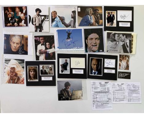 A collection of memorabilia, props and autographs from James Bond films to include: two prop bank notes, five Quantum of Sola