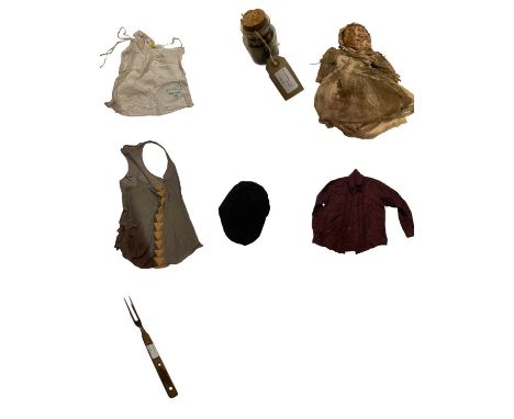 A collection of costumes and props from Buffy (TV Series) signed shirt, Dracula (1992), Priest (2011), Underworld 3 (2009), T