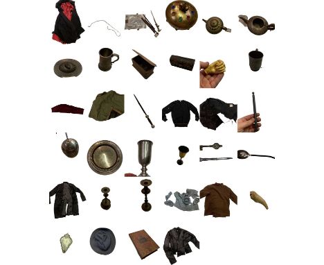 A collection of costumes and props used in the production of the Harry Potter films. Items to include:Prop books from Profess